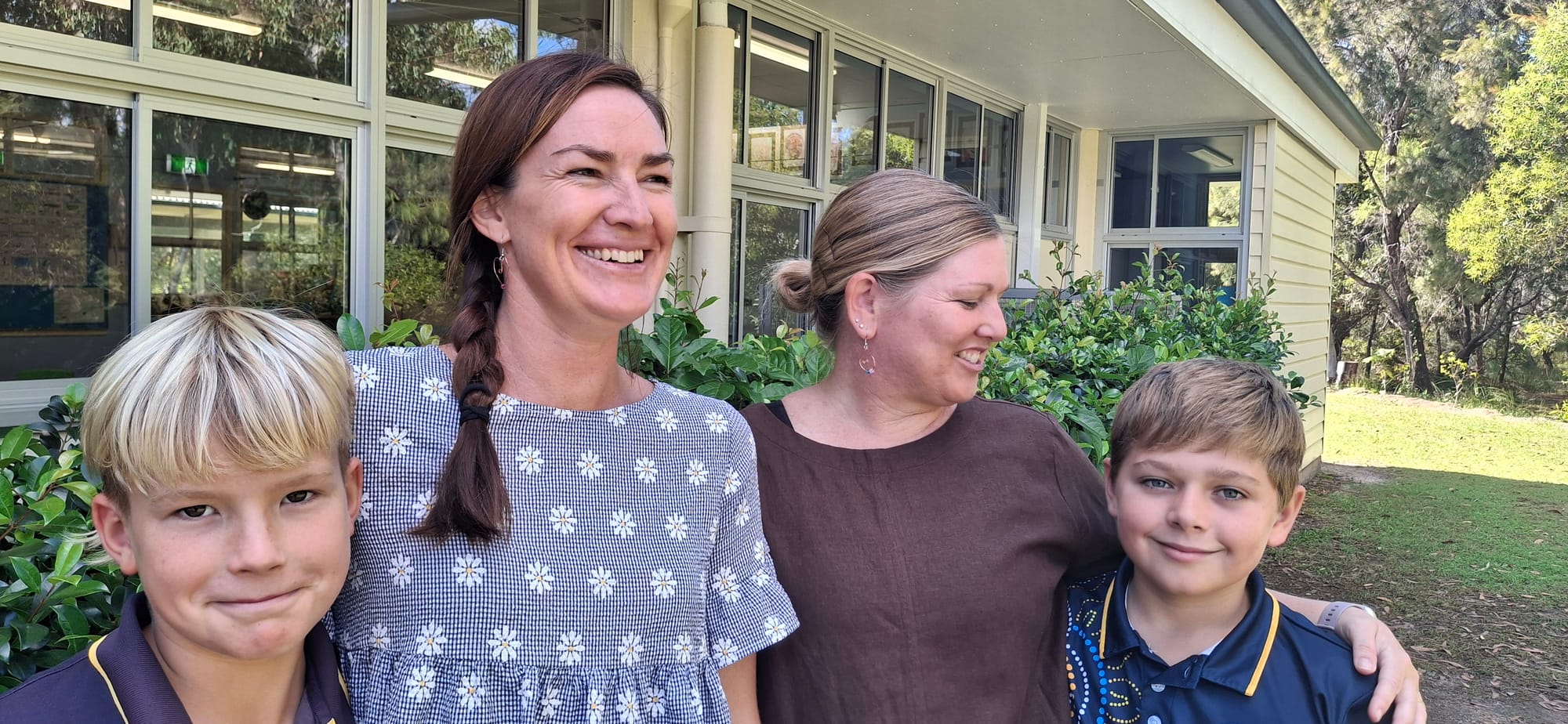 Some mums show off their fabulous earrings made for them by the students for Mother’s Day.