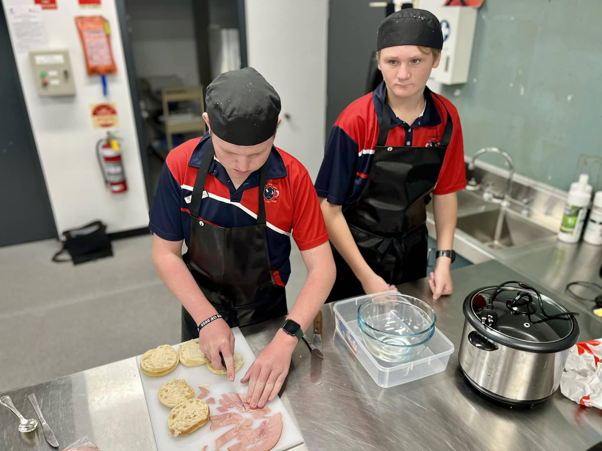 Ashtyn de Serio and Roy Ferreira in the kitchen.