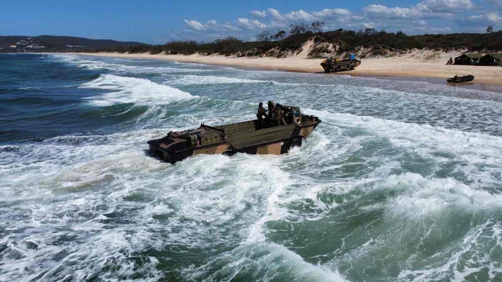 Surf, Sand, and Soldiers: Exercise Surfing Penguin Returns to Rainbow Beach post image