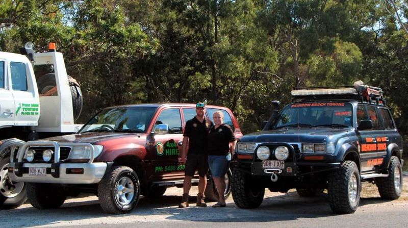 Dave and Carolyn Elder with just some of their Hire and Recovery fleet