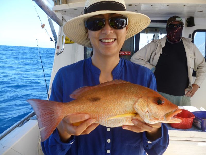 Debbie with her pearl perch