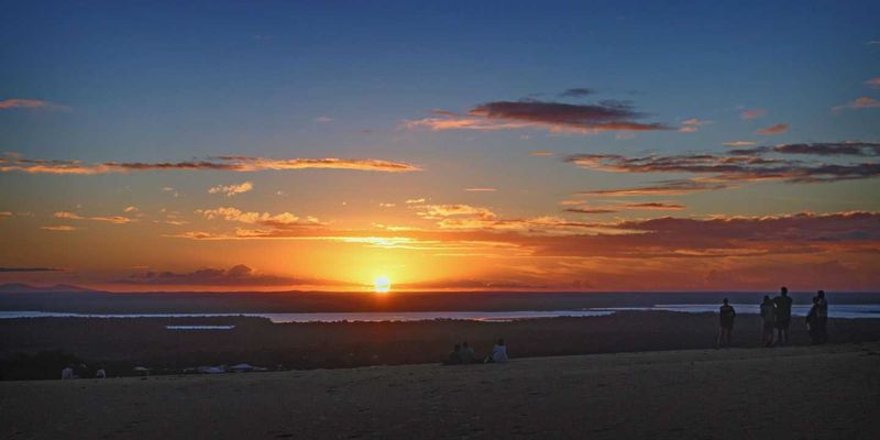 Watching the Sunset at Carlo Sandblow Image Julie Hartwig