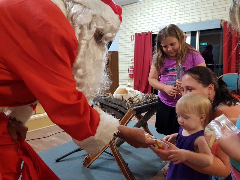 Santa hands out sweet treats