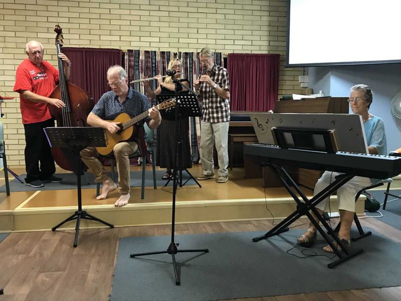 Frank on Bass Gunther on guitar Debbie on flute Len on treble recorder and Pam on piano