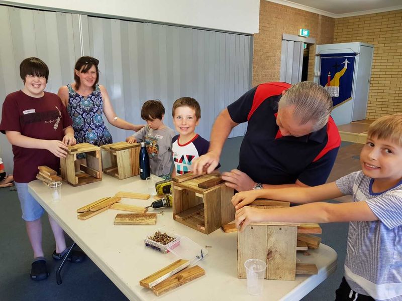 Busy little bees enjoy making planter boxes with Paul Vick
