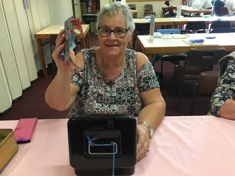 Judy collects money for the CWA Hoy entries
