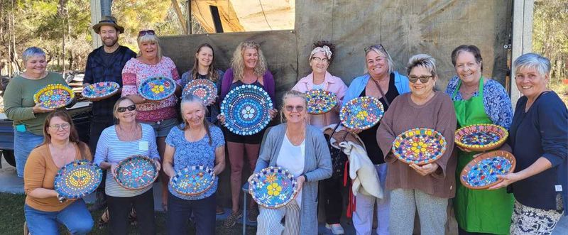 Proud mosaic makers with our finished products ready for grouting and sealing