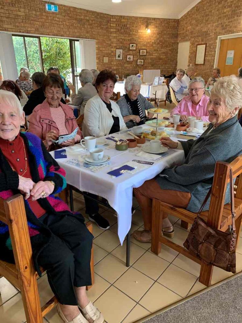 Enjoying scones at our 100th birthday celebration