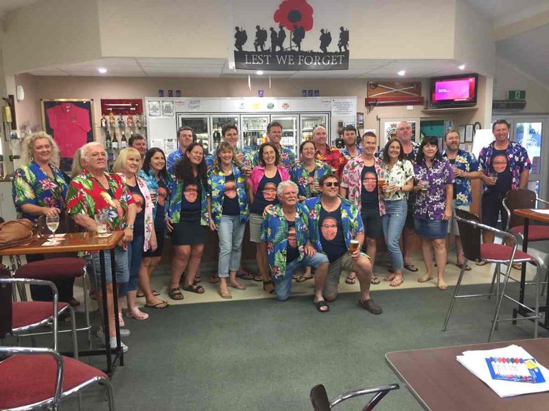 Birthday celebrations being enjoyed by a colourful crowd at the Tin Can Bay RSL