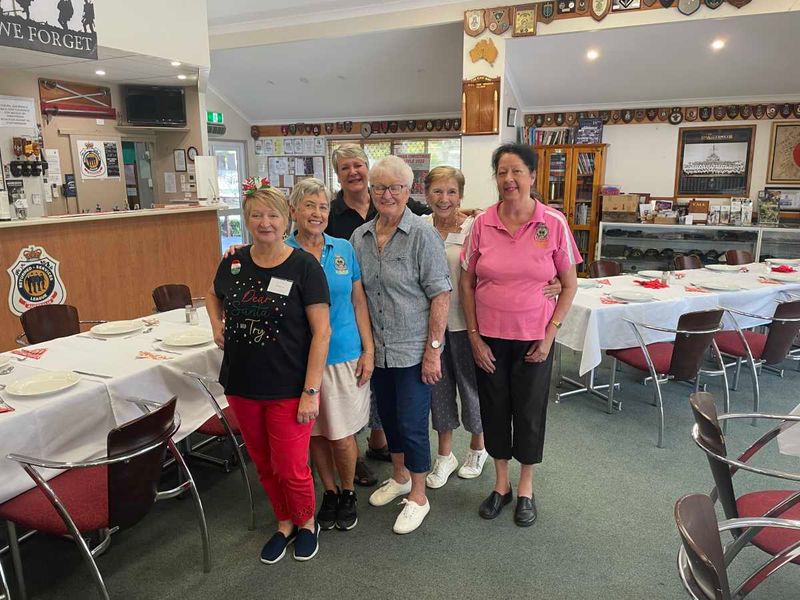 Tin Can Bay RSL volunteer ladies are fully prepared for the annual Line Dancers Christmas Party