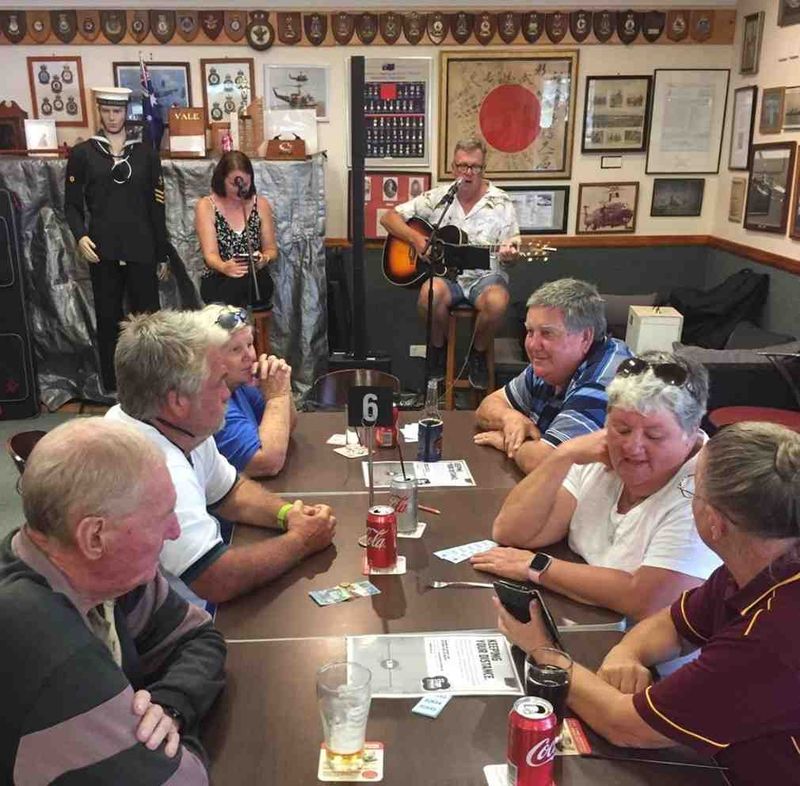 Patrons enjoying Sunday's BBQ on the deck with music at the Tin Can Bay RSL