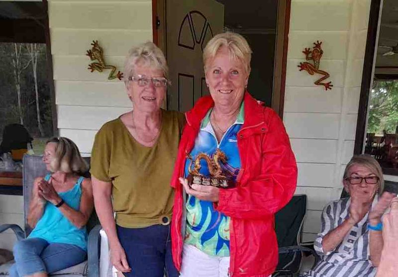 Cooloola Dragon Boat’s Head Coach, Sandra Wooster, presents Coach's award trophy to Assistant Coach, Helen Hurworth