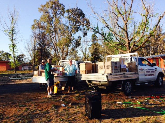 Tony Stewart handing over a ute-load of food to Baradine CWA on the way to Victoria last week
