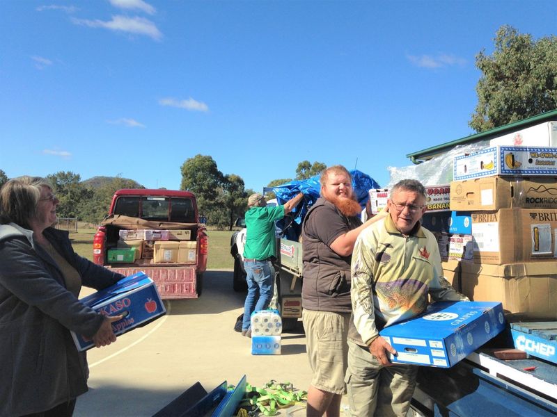Tony Stewart from Droughtrunners and volunteers unloading donations to Mitchell last month
