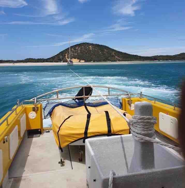 Tin Can Bay Coastguard conduct a yacht tow from Rainbow Beach