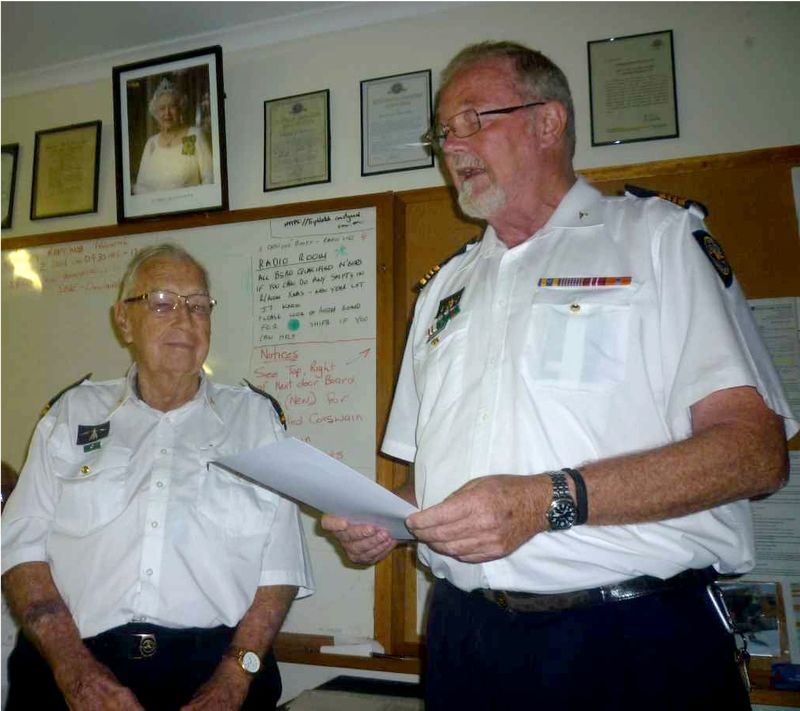 Commander John Macfarlane presented a certificate of appreciation to Brian Morris please lighten - remove person in the backg