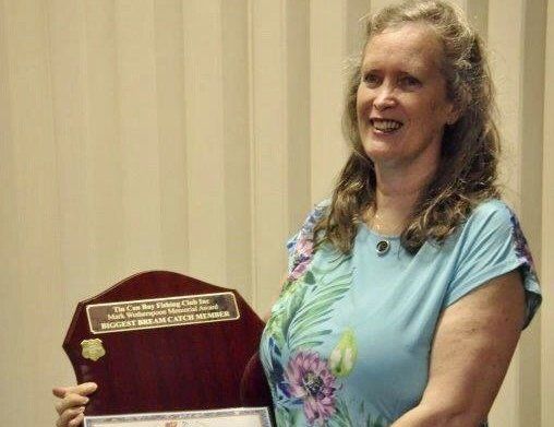 Margie receiving the trophy for Biggest Bream on behalf of her late husband, Mark Wotherspoon. Mark was a very much loved and