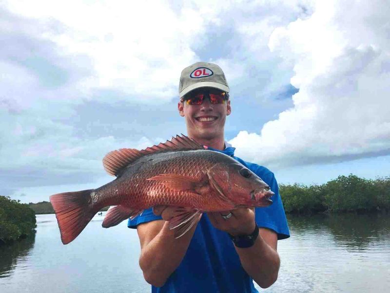 Gardiner Fisheries - Alex Brantz with a Mangrove Jack