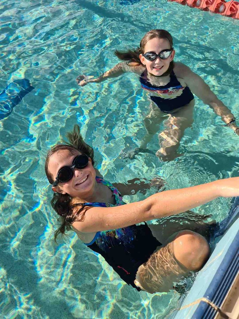 Local squad members, Keira and Maia, cool down at the pool