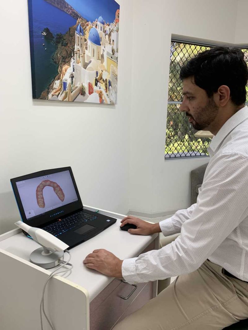 Dr Abhi Sharma, from Cooloola Cove Smiles at Tin Can Bay - designing a crown on the three-dimensional scan