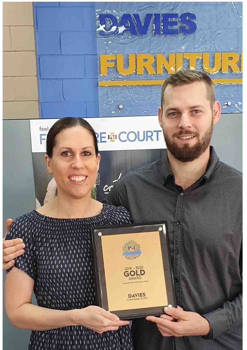 Owners of Davies Furniture Court Gympie, Linda and Mark Tunstall ,win gold