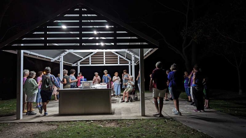 The twilight walkers enjoy refreshments after their walk to celebrate International Women’s Day.