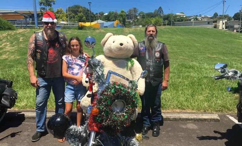 Club President Stephen ‘Moose’ Ollier, Keira Powers, and Stephen O’Shea with a giant teddy donated by one of the RBSS student