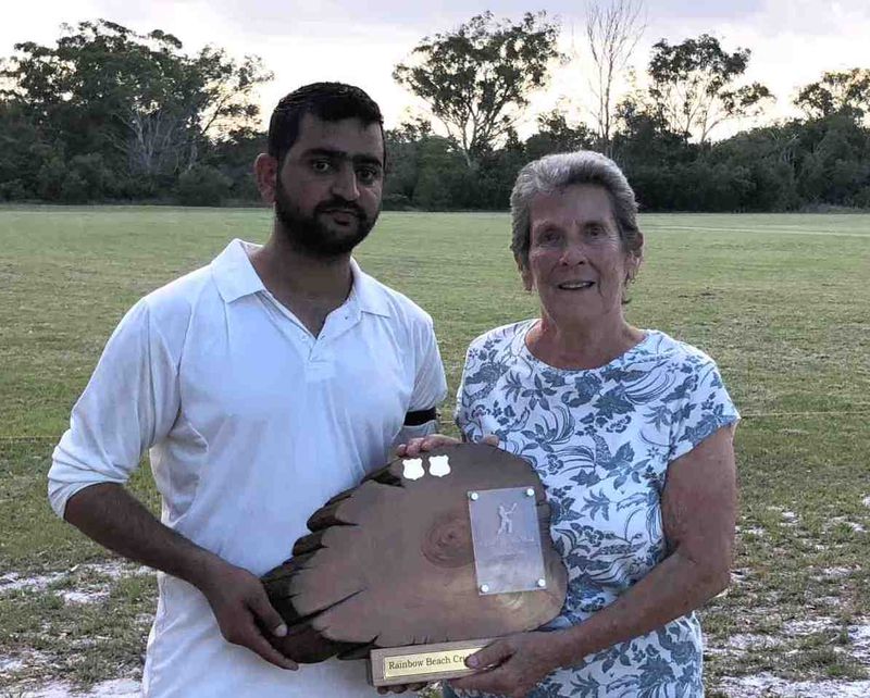 Cricket - Muhommad Adeel Abid and Edith McBride with the Man of the Match trophy