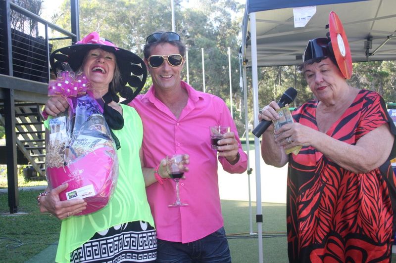 Ruth Modin hands over winnings to Melissa Ord and John Hickox