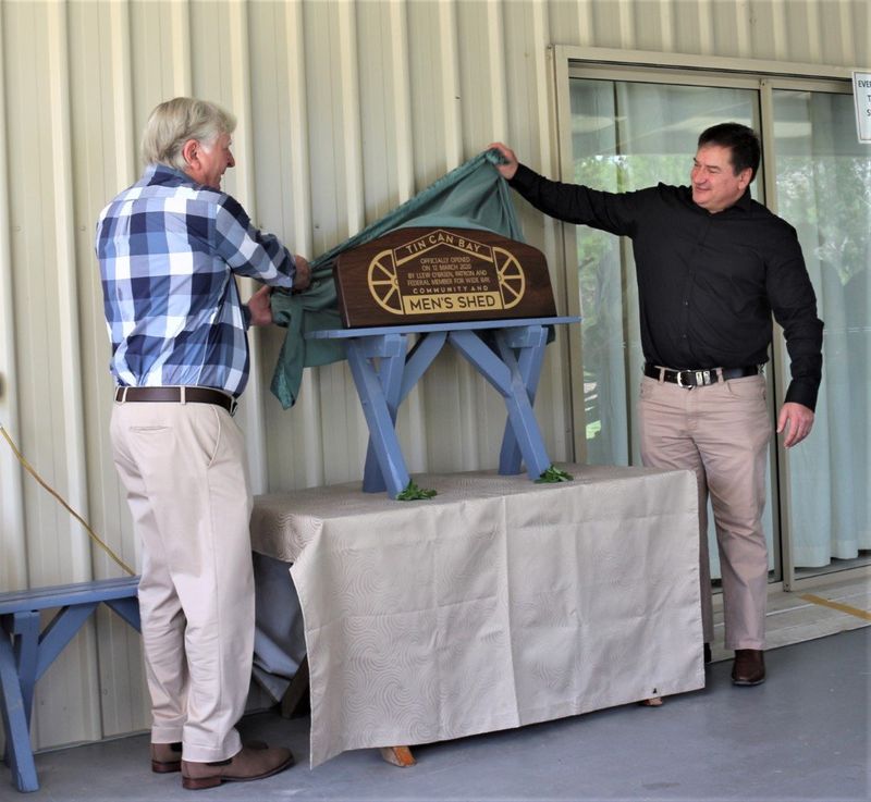 Pictured raising the presented State Flag at the Men’s Shed Opening were Graham Langdown, President; Llew O'Brien - Federal M