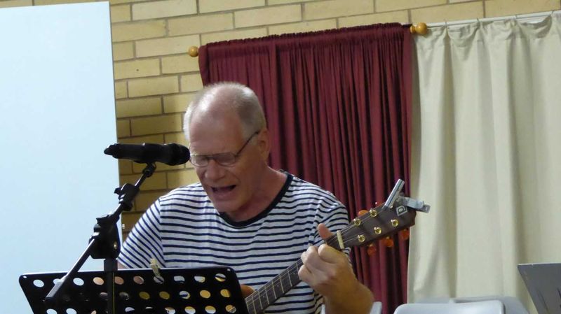 Gunther Vollmer on guitar and vocals at Music Plus