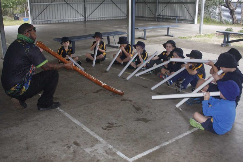 Maurice Kissier shows Rainbow Prep boys the didgeridoo