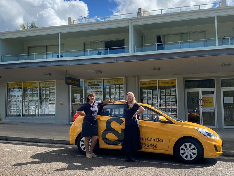 New owner of Raine and Horne Tin Can Bay, Celly Jeal, taking over from previous owner Robin Creighton