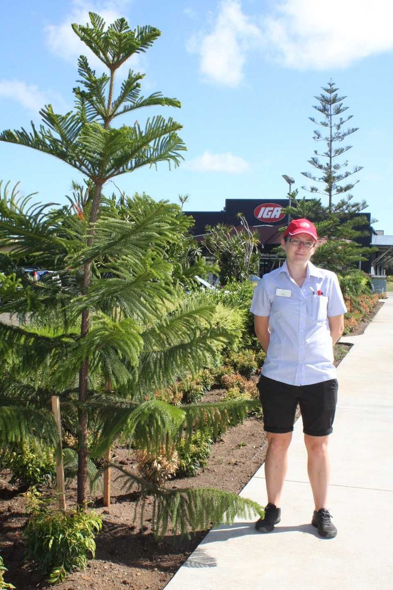 Tin Can Bay IGA Manager, Kylie Rayson, shows some of the new plantings and beautification in the Tin Can Bay shopping precinc