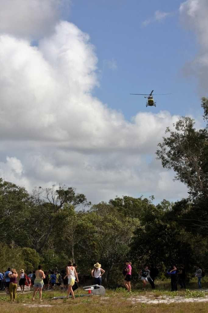 School kids, teachers and parents watched on as a helicopter landed on the oval during sports day