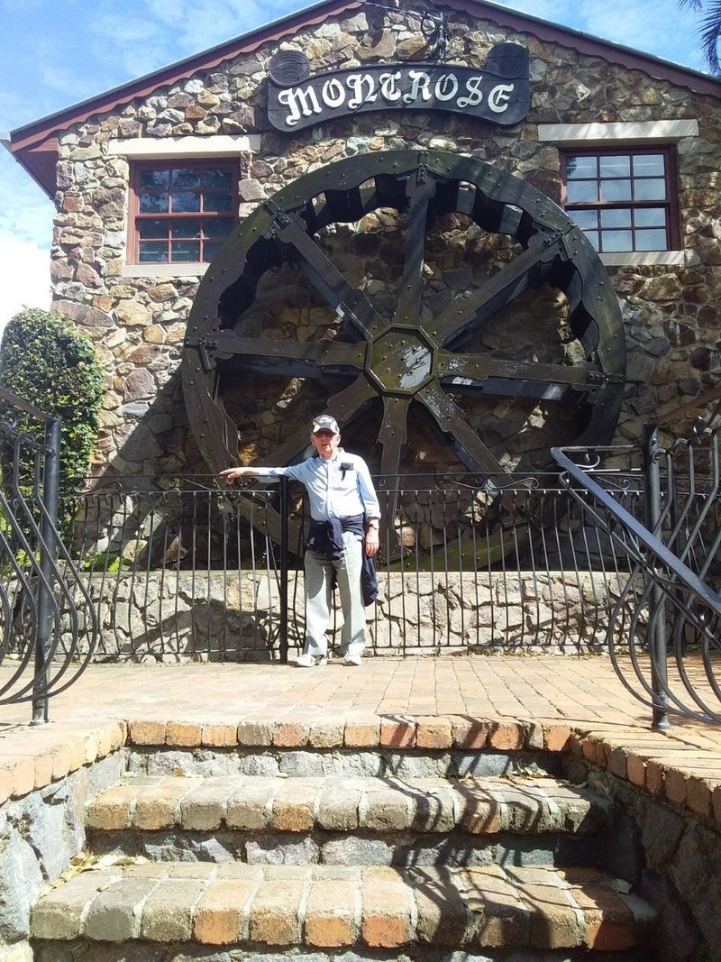 A worn-out Probian (John Olson) leaning up against the fence in front of the Montrose Waterwheel at Montville during a recent