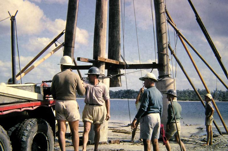 Energex electrician, Ian Ross's photo from July 1965 onsite building the power line across Tin Can Bay Inlet