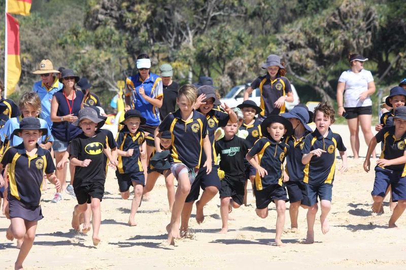 The RBSS Fun Run is about to start at the flags on Rainbow Beach….