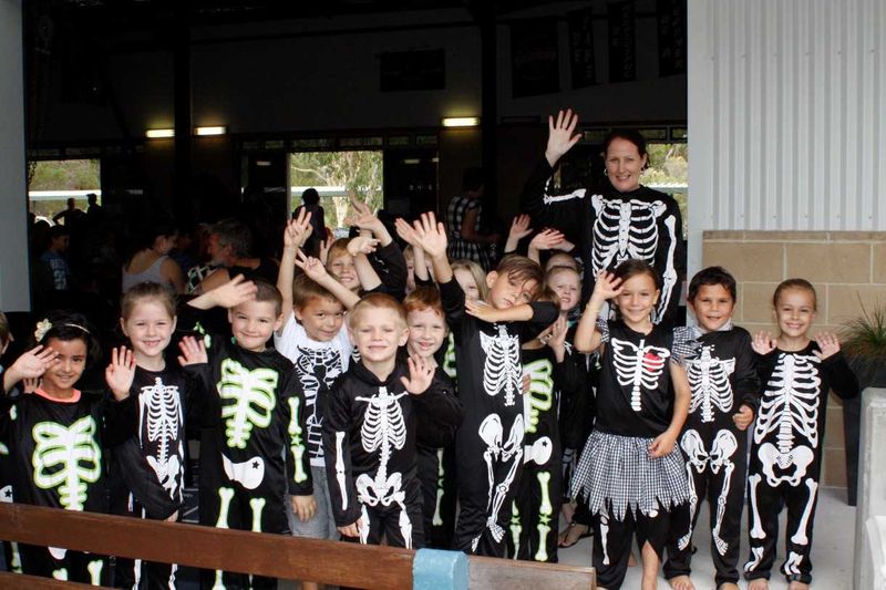 Prep 1 skeletons are shepherded by teacher Stacey Searl