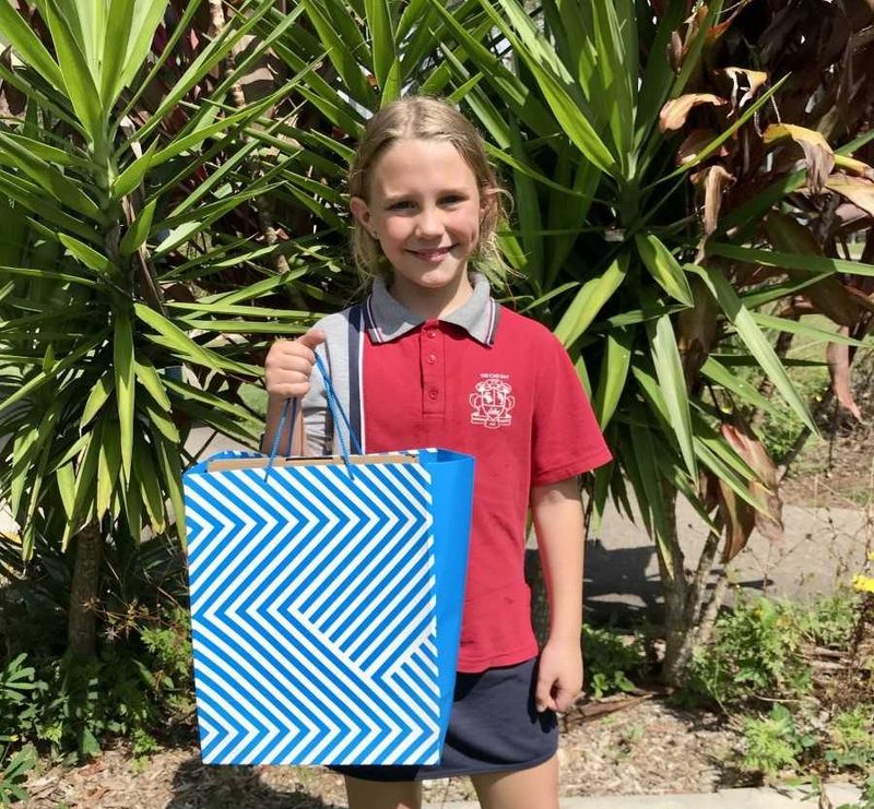 Kaylee with her prize from the Flower Show