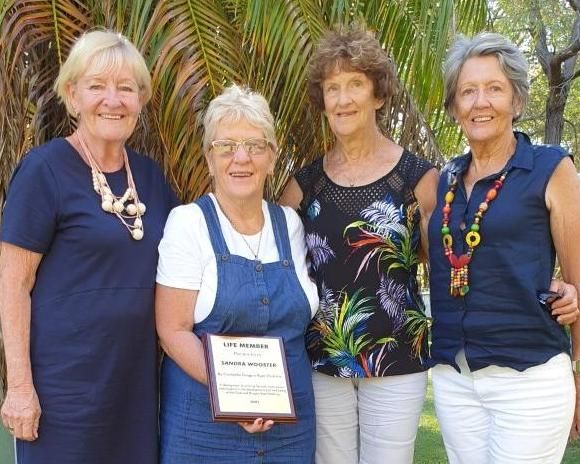Head Coach Sandy Wooster being presented with Life Membership of CDBC. (L-R) Kerri Southern, Sandy, Elaine Dimmock, and Pam G