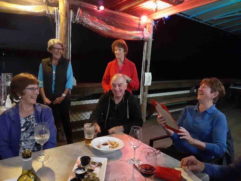 Octogenarian Norma Sanderson celebrating with fellow Dragons and friends at TCB Yacht Club: Andra Casey, Pam Corey, Vic Vella