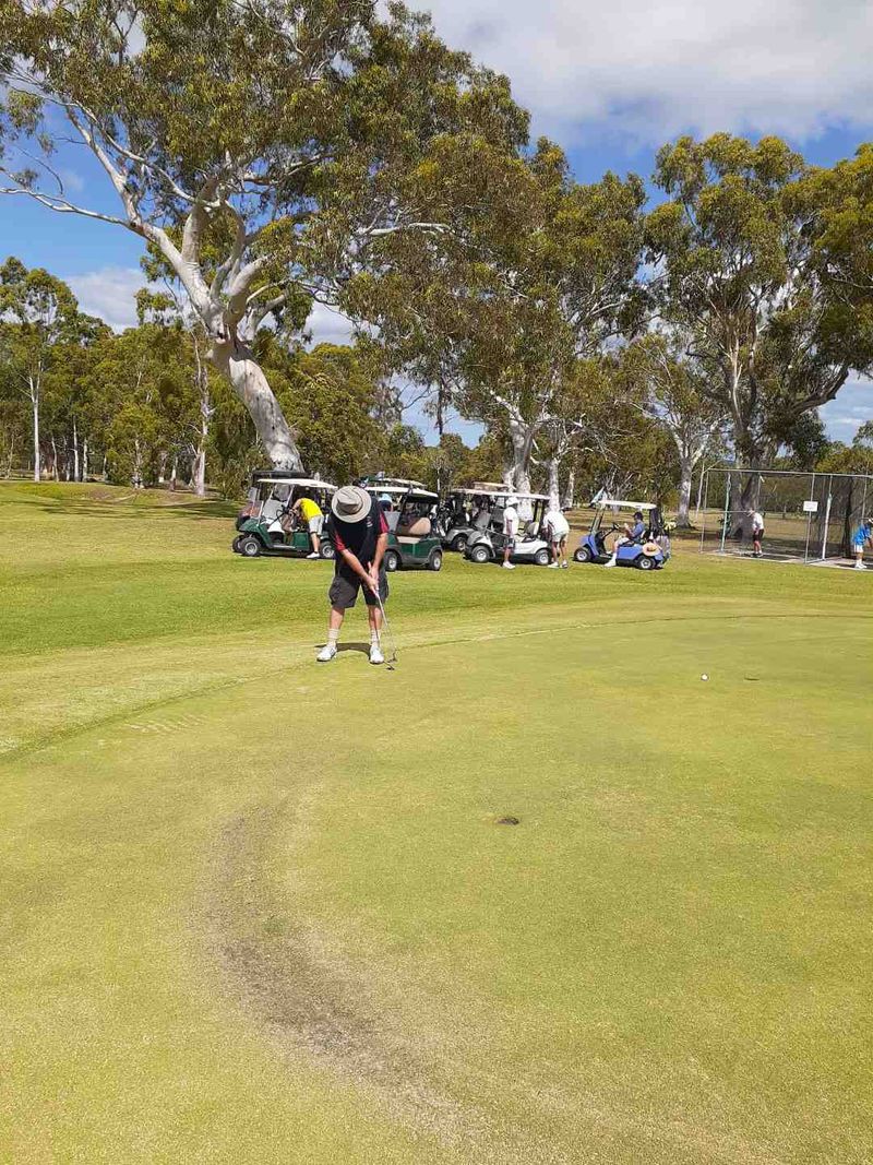 Members preparing before teeing off