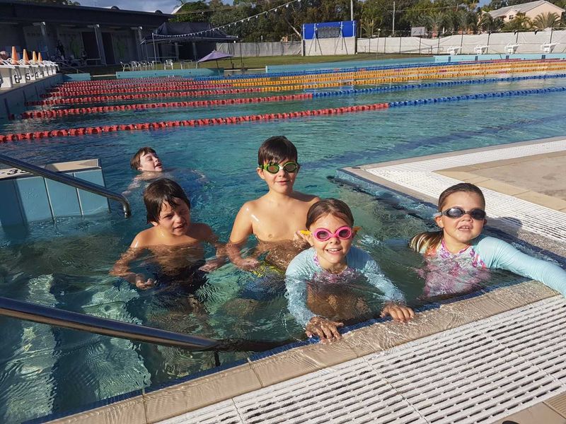 The Warriors morning swim squad are all smiles