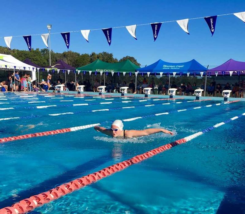 Annie White took home a silver medal in 100m fly and bronze in 200m breast (11 year old girls) and smashed 6 seconds off her