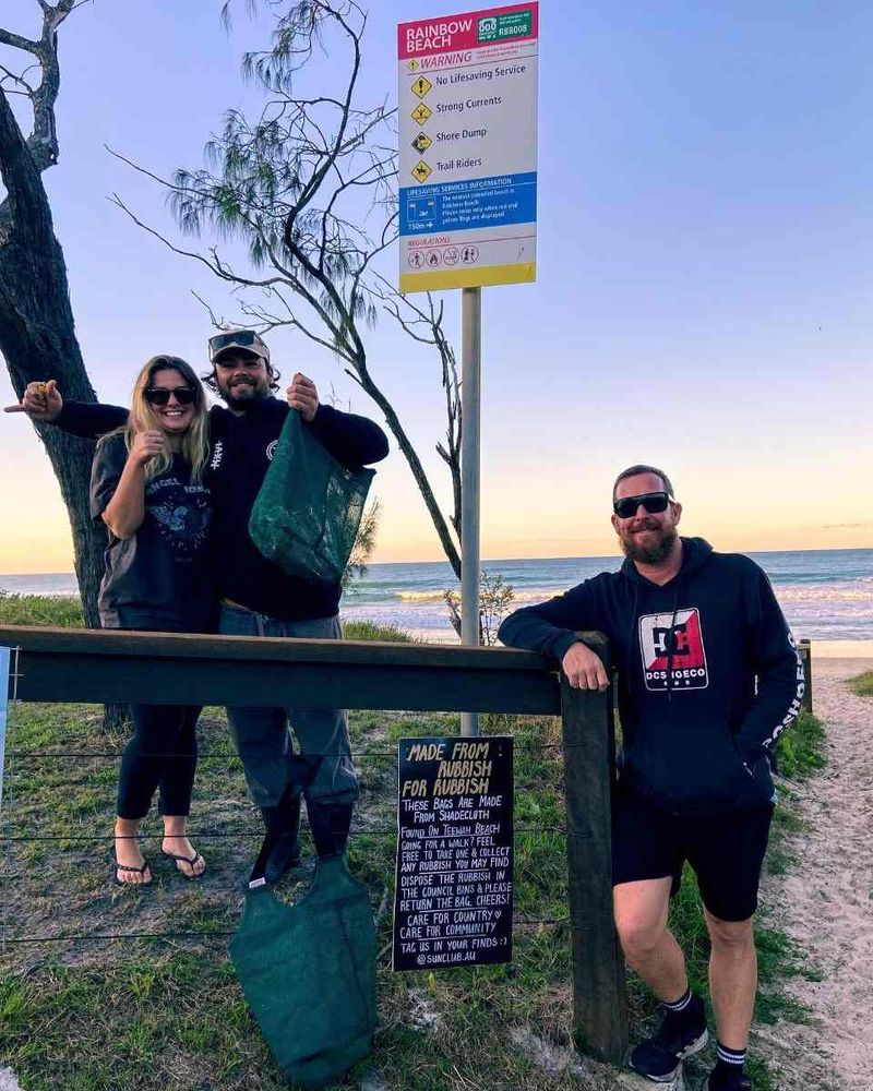 Locals making good use of the handmade rubbish bags supplied by Sun Club at our beach exits. Printed with permission.