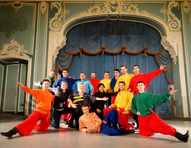 Tineka Williams with the traditional cossack dancers at the Beloselsky-Belozersky Palace in Saint Petersburg, Russia
