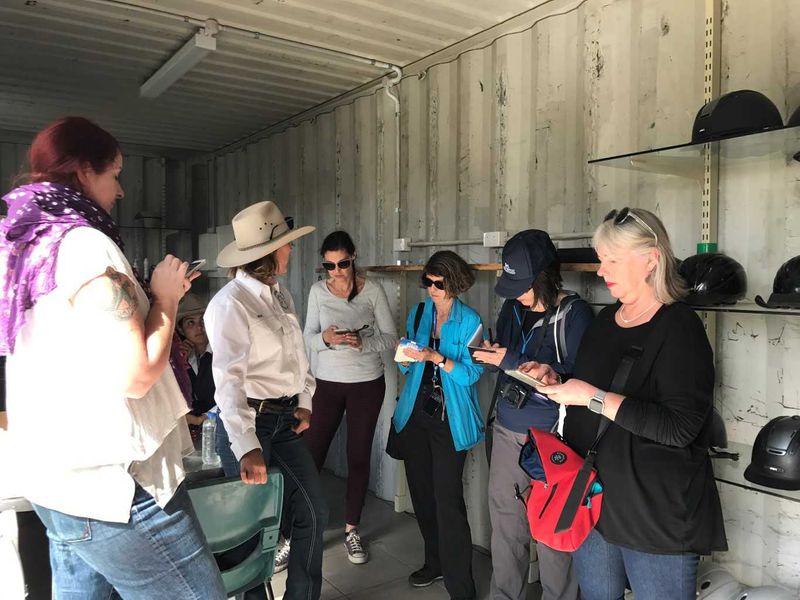 After their horse ride, one group from the Australian Society of Travel Writers go to work!