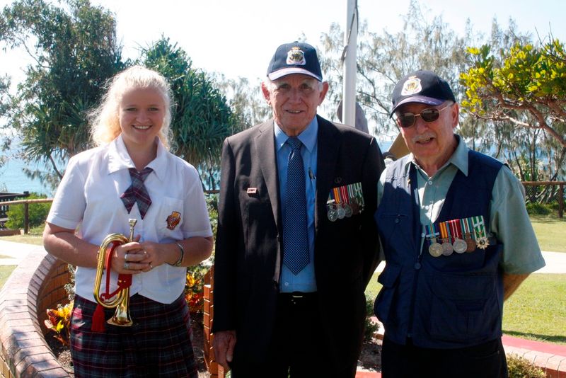 Bugler, Jamie Lee Griffiths, her grandfather Reverend Bruce Dorman and RSL sub-branch executive President Joe Casey led the V