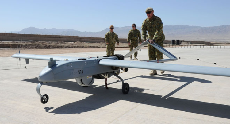 The Shadow TUAS being retrieved by army personnel after another successful flight.